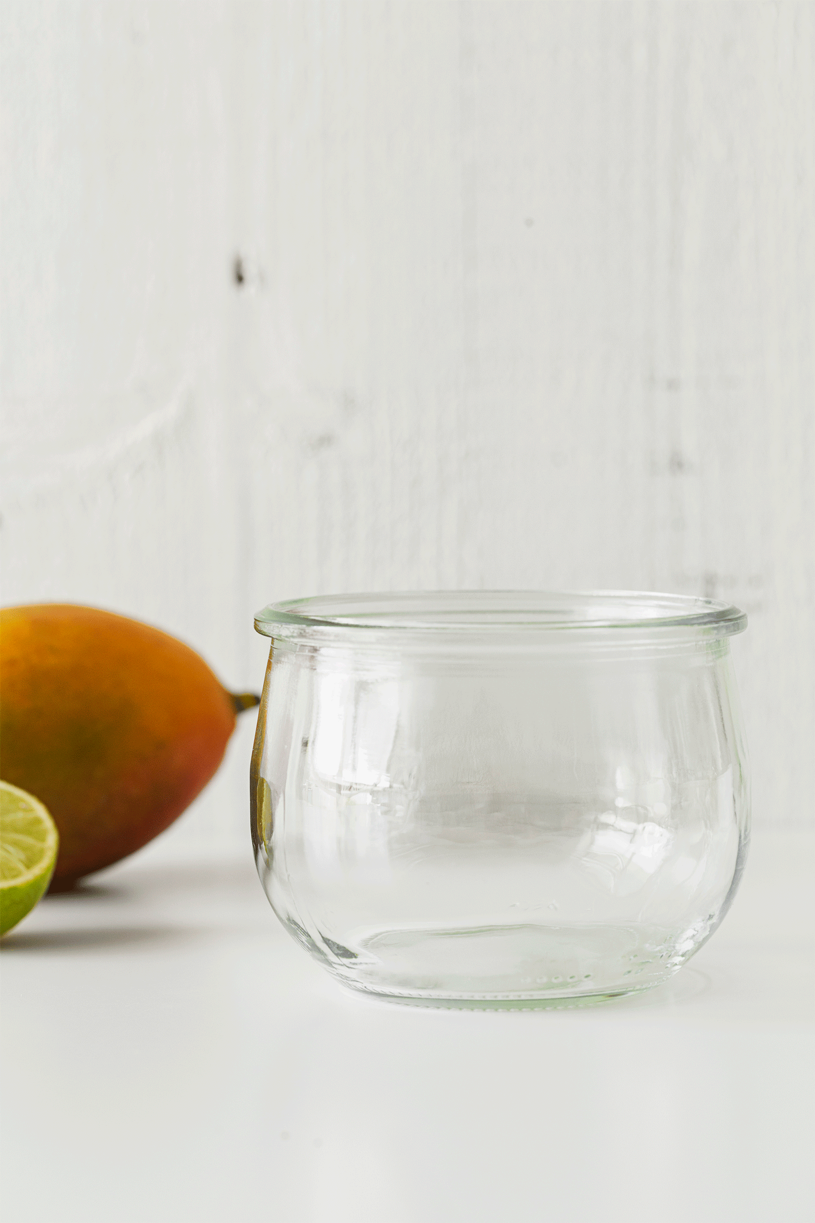 Animated gif of the assembly of a mango cashew yogurt jar.