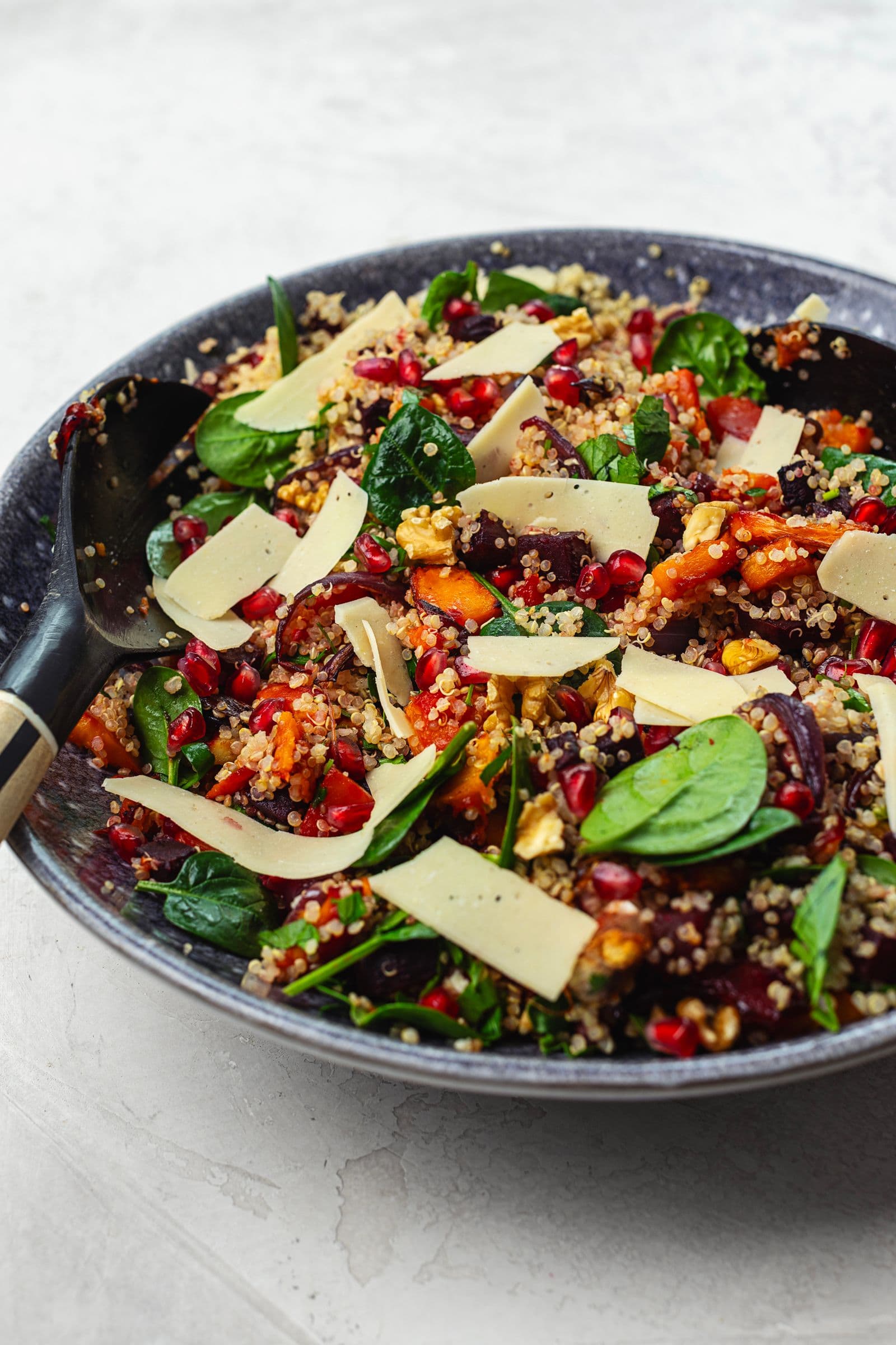 Winter quinoa salad with roasted squash, beetroot, spinach, pomegranate, walnuts and vegan cheese.